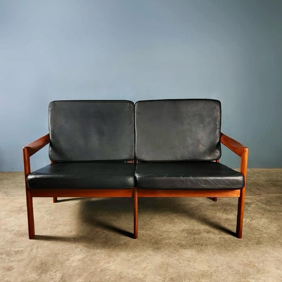 SOLD Danish Two Seater Sofa Illum Wikkelsø For Niels Eilersen Black Leather Teak 1960s Mid Century Vintage Retro MCM