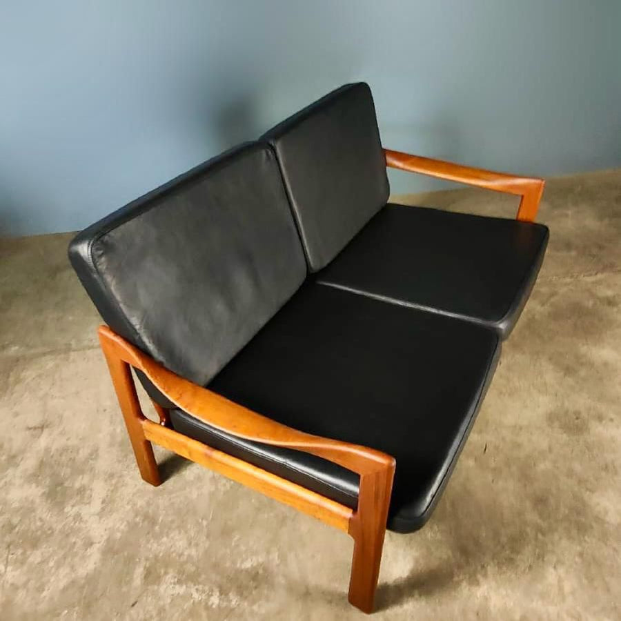 SOLD Danish Two Seater Sofa Illum Wikkelsø For Niels Eilersen Black Leather Teak 1960s Mid Century Vintage Retro MCM